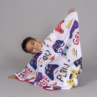 CAPA DE PELUQUERIA INFANTIL ESTAMPADA
